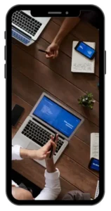 Smartphone displaying a business promotion demonstrating the use of CapCut Pro APK